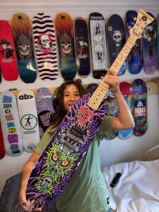Monster Mak and his custom Skateboard Guitar®