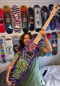 Monster Mak and his custom Skateboard Guitar®